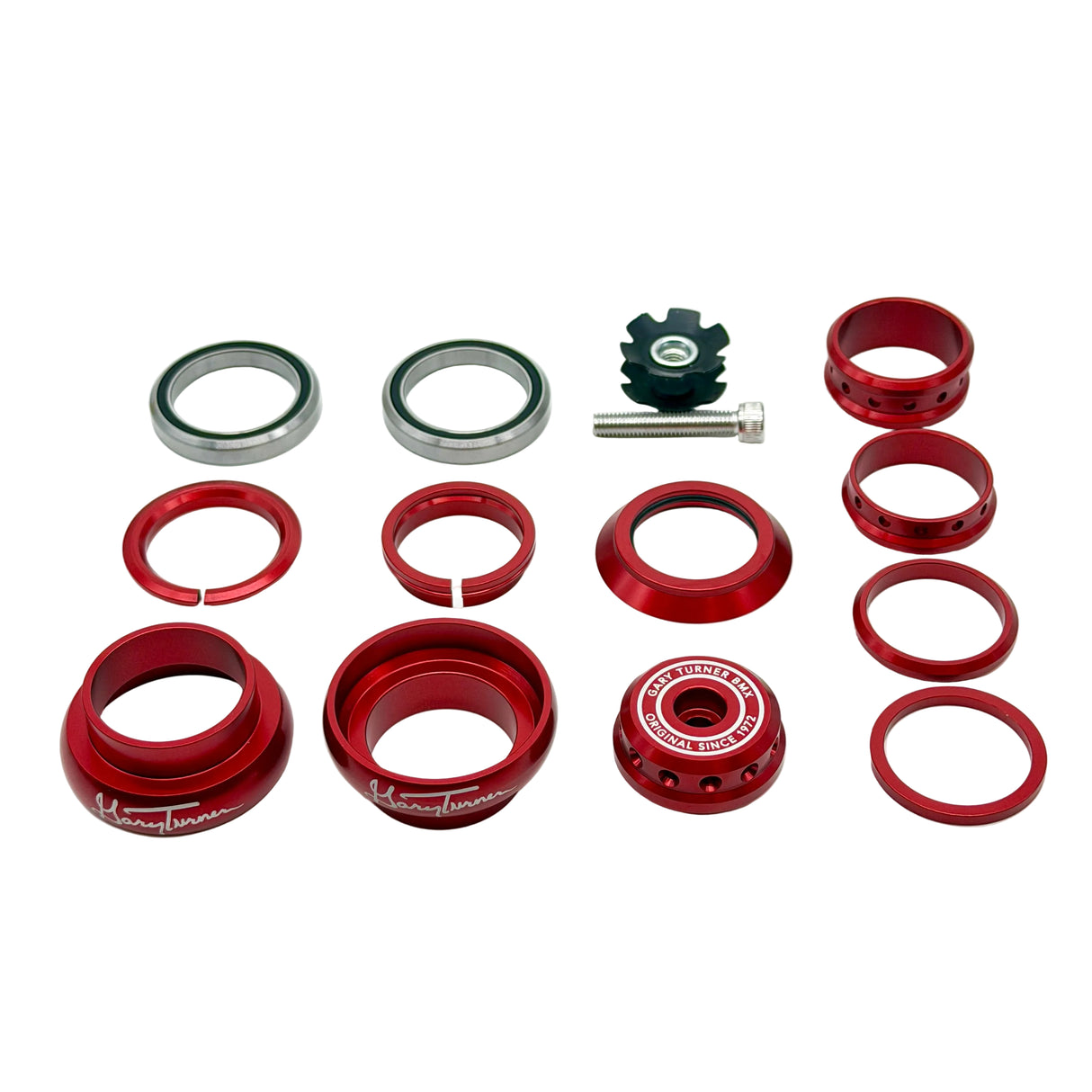 An 11-piece set of red anodized metal bicycle headset components, including cones, rings, seals, and a black spacer, arranged neatly on a white background.