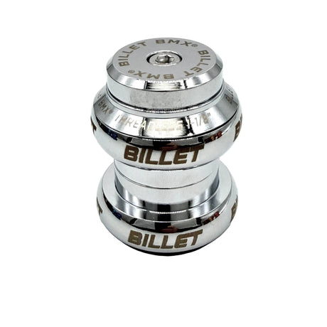 A shiny chrome metallic bicycle headset with 'BILLET' engraved on the sides, photographed on a white background.