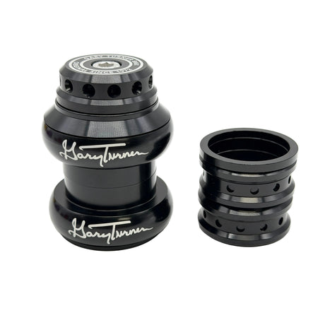 A black metal bicycle headset and matching spacer ring set, featuring the brand name 'Gary Turner' in white script on the main components, photographed on a clean white background.