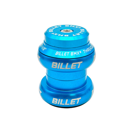A light blue anodized bicycle headset from Billet BMX, featuring white branding text, shown on a clean white background.