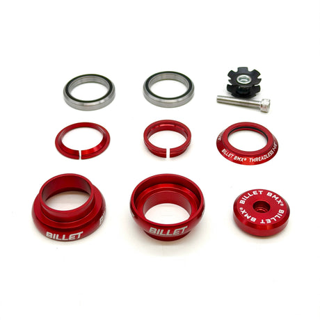 An 8-piece bicycle headset bearing and spacer kit, featuring red anodized aluminum components, silver steel bearings, and a black star-shaped lock nut, laid out on a white background. The components feature the 'BILLET' brand name printed in white.